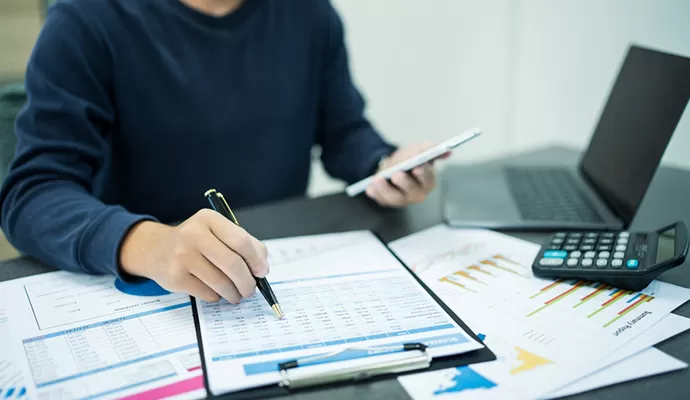 Accountant reviewing payroll and super reports